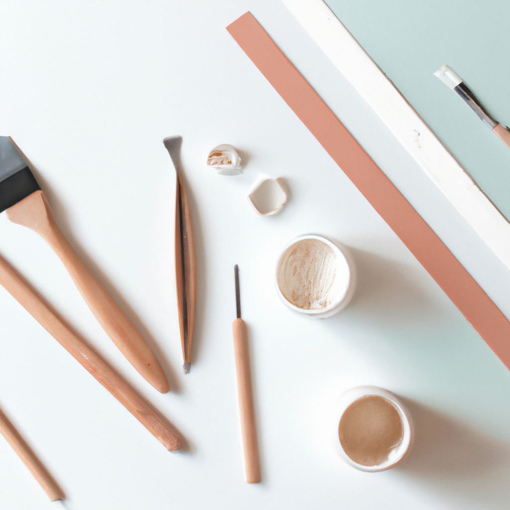 Outils de modelage et argile autodurcissante sur une table claire